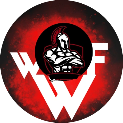 Best Free Health And Fitness Advice Online 2026 Warrior Fitness logo: A muscular Spartan warrior with arms crossed inside a black circle, overlaid on a large white 'WF' letter, set against a red and black smoky background